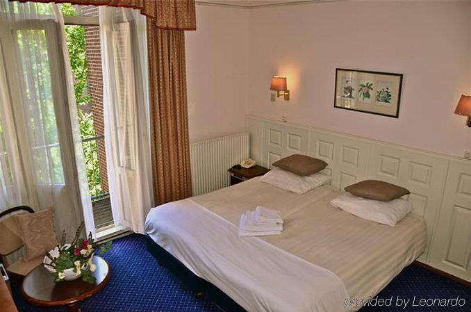 Apple Inn Hotel Amsterdam Pokoj fotografie